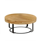 Table basse ronde moderne en bois avec pieds en métal
