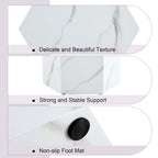 Table basse hexagonale texturée avec patins antidérapants, idéale pour les petits espaces de salon.