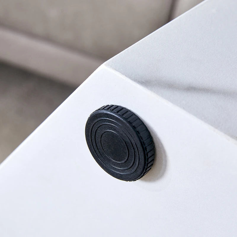 Table basse hexagonale texturée avec patins antidérapants, idéale pour les petits espaces de salon.