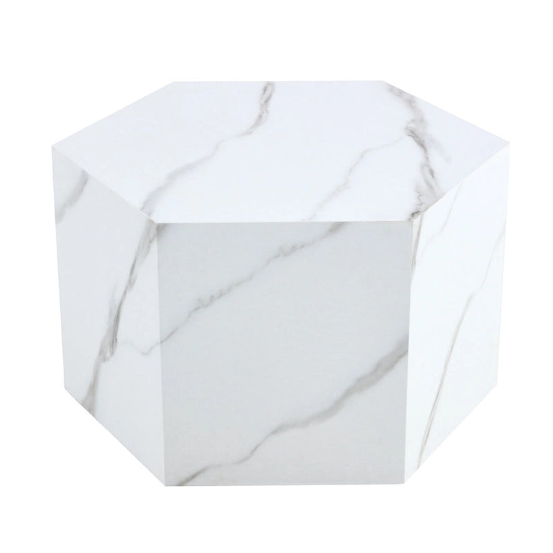 Table basse hexagonale texturée avec patins antidérapants, idéale pour les petits espaces de salon.