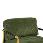 Fauteuil d'appoint moderne avec coussins moelleux, structure métallique minimaliste et accoudoirs en bois.