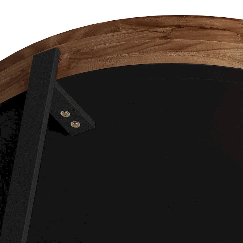 Table basse ronde moderne rétro avec plateau en bois de sapin et piètement croisé noir, idéale pour le salon.