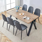 Ensemble de salle à manger moderne avec table rectangulaire noire en forme de A et chaises à dossier rond