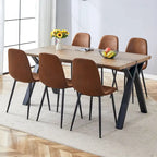 Ensemble de salle à manger moderne avec table rectangulaire noire en forme de A et chaises à dossier rond