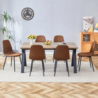 Ensemble de salle à manger moderne avec table rectangulaire noire en forme de A et chaises à dossier rond