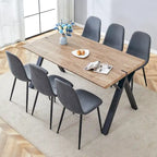 Ensemble de salle à manger moderne avec table rectangulaire noire en forme de A et chaises à dossier rond