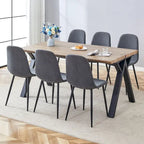 Ensemble de salle à manger moderne avec table rectangulaire noire en forme de A et chaises à dossier rond