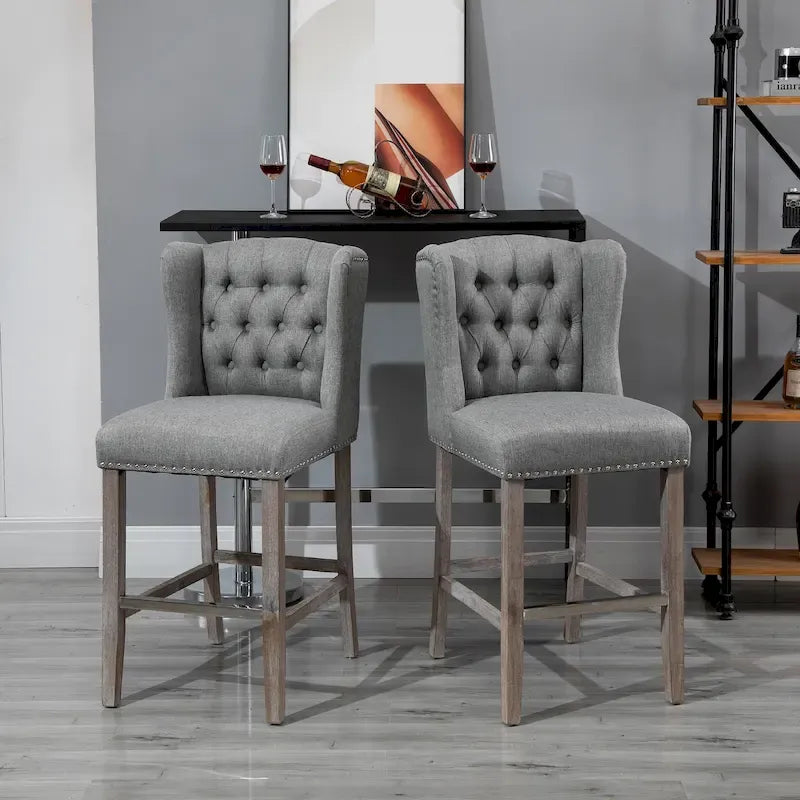 Tabourets de bar HOMCOM (lot de 2) pour cuisine et petit-déjeuner, avec garniture cloutée, dossier capitonné et pieds en bois massif.