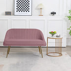 Canapé deux places contemporain capitonné avec pieds en métal doré, idéal pour le salon ou la chambre.