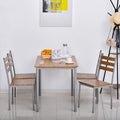 Ensemble de salle à manger moderne HOMCOM 5 pièces en bois : 1 table et 4 chaises avec pieds en métal.