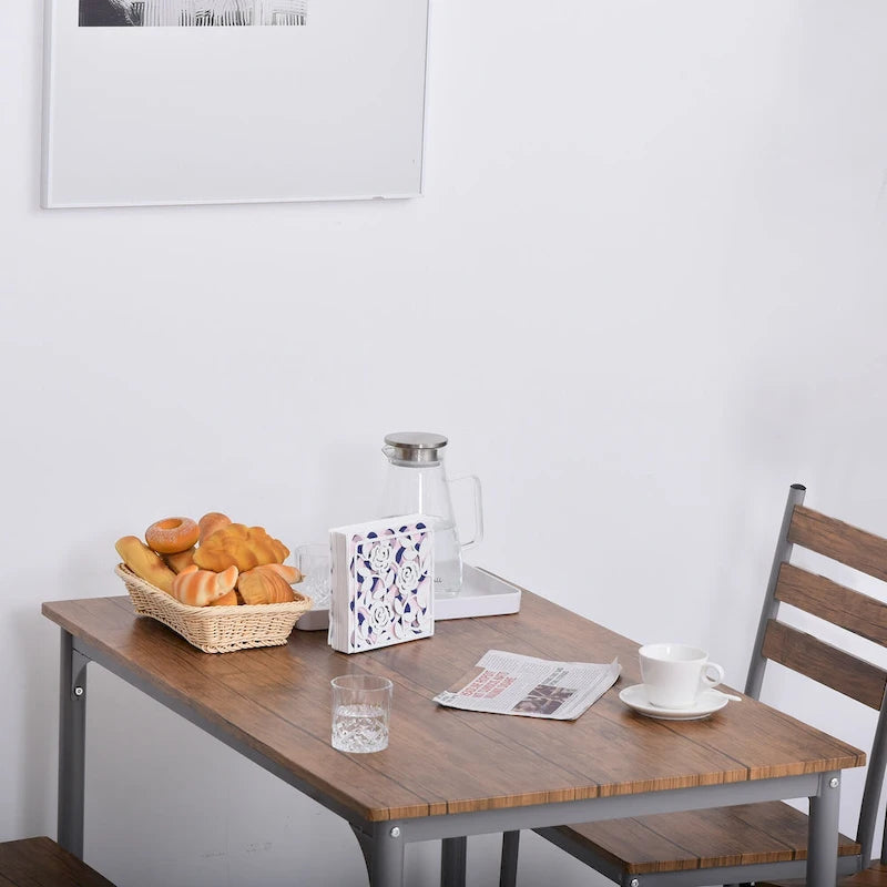 Ensemble de salle à manger moderne HOMCOM 5 pièces en bois : 1 table et 4 chaises avec pieds en métal.