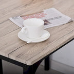 Ensemble de salle à manger moderne HOMCOM 5 pièces en bois : 1 table et 4 chaises avec pieds en métal.