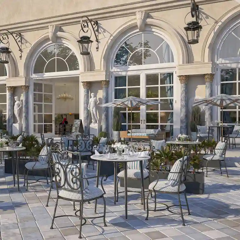Table de salle à manger ronde avec plateau en marbre et pieds en métal, idéale pour la salle à manger ou la cuisine.