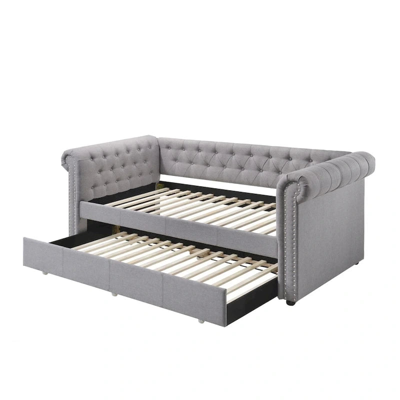Lit de jour Chesterfield une place avec lit gigogne intégré et finitions cloutées, gris