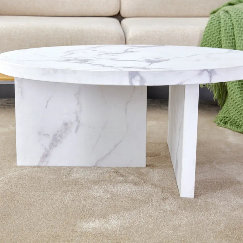 Table basse ronde en MDF blanc à motifs, idéale pour les petits espaces et les salons.