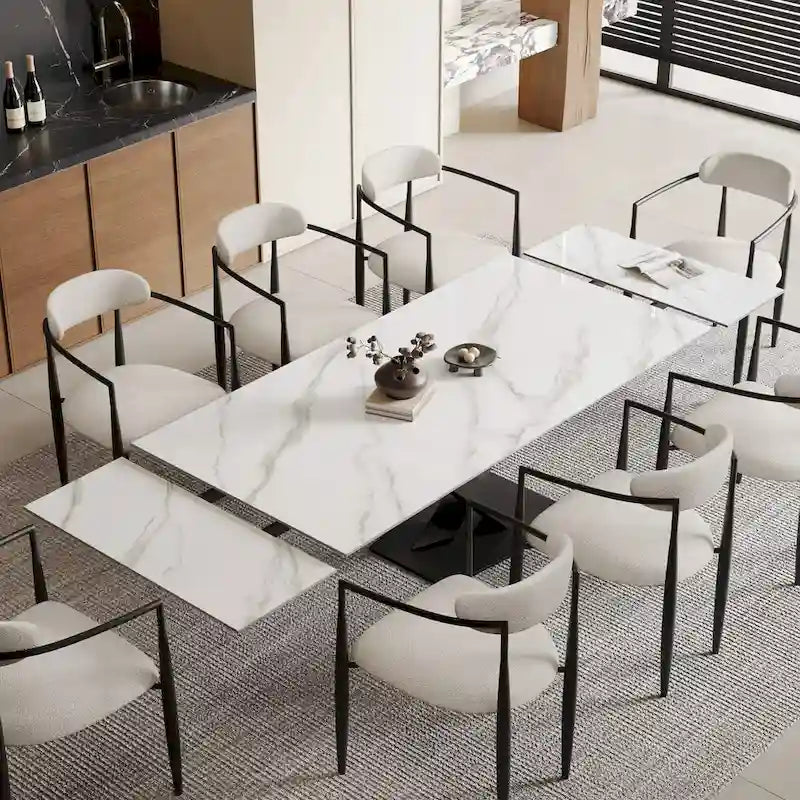 Ensemble de salle à manger 9 pièces, moderne et minimaliste, extensible, avec plateau en pierre frittée et 8 chaises en tissu (94,48 €).
