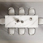 Ensemble de salle à manger 9 pièces, moderne et minimaliste, extensible, avec plateau en pierre frittée et 8 chaises en tissu (94,48 €).