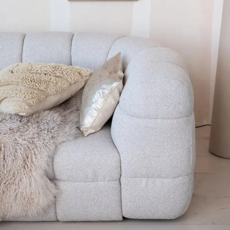 Canapé incurvé capitonné Mlange